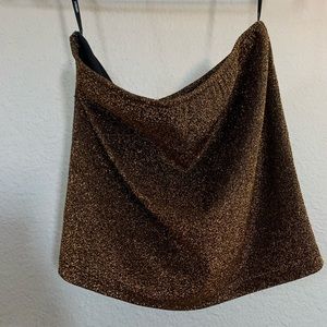 Gold sparkled tube top.